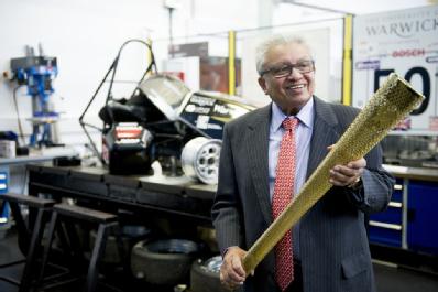 Bhattacharyya with Olympic torch
