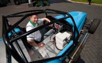 Research engineer Stephen Lambert with the hybrid kit car at the University of Warwick