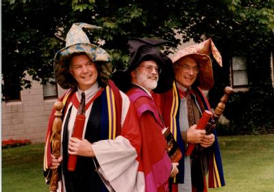 From left Professor Ian Stewart (University of Warwick) and Terry Pratchett and Doctor Jack Cohen (University of Warwick) at the wizard making - image copyright University of Warwick