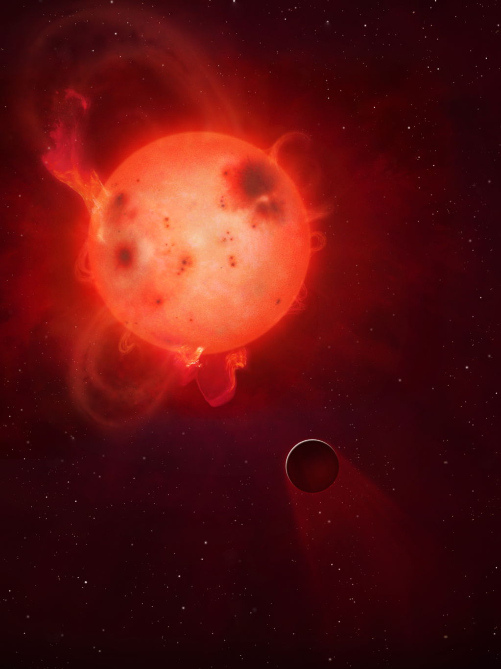 Image caption: Kepler-438b: The planet Kepler-438b is shown here in front of its violent parent star. It is regularly irradiated by huge flares of radiation, which could render the planet uninhabitable. Here the planet’s atmosphere is shown being stripped away.