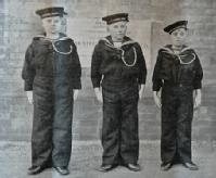 black and white photo of 3 young boys in naval uniform