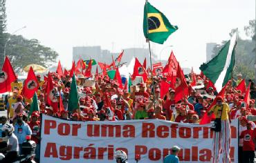 Brazillian rally with banner and flags