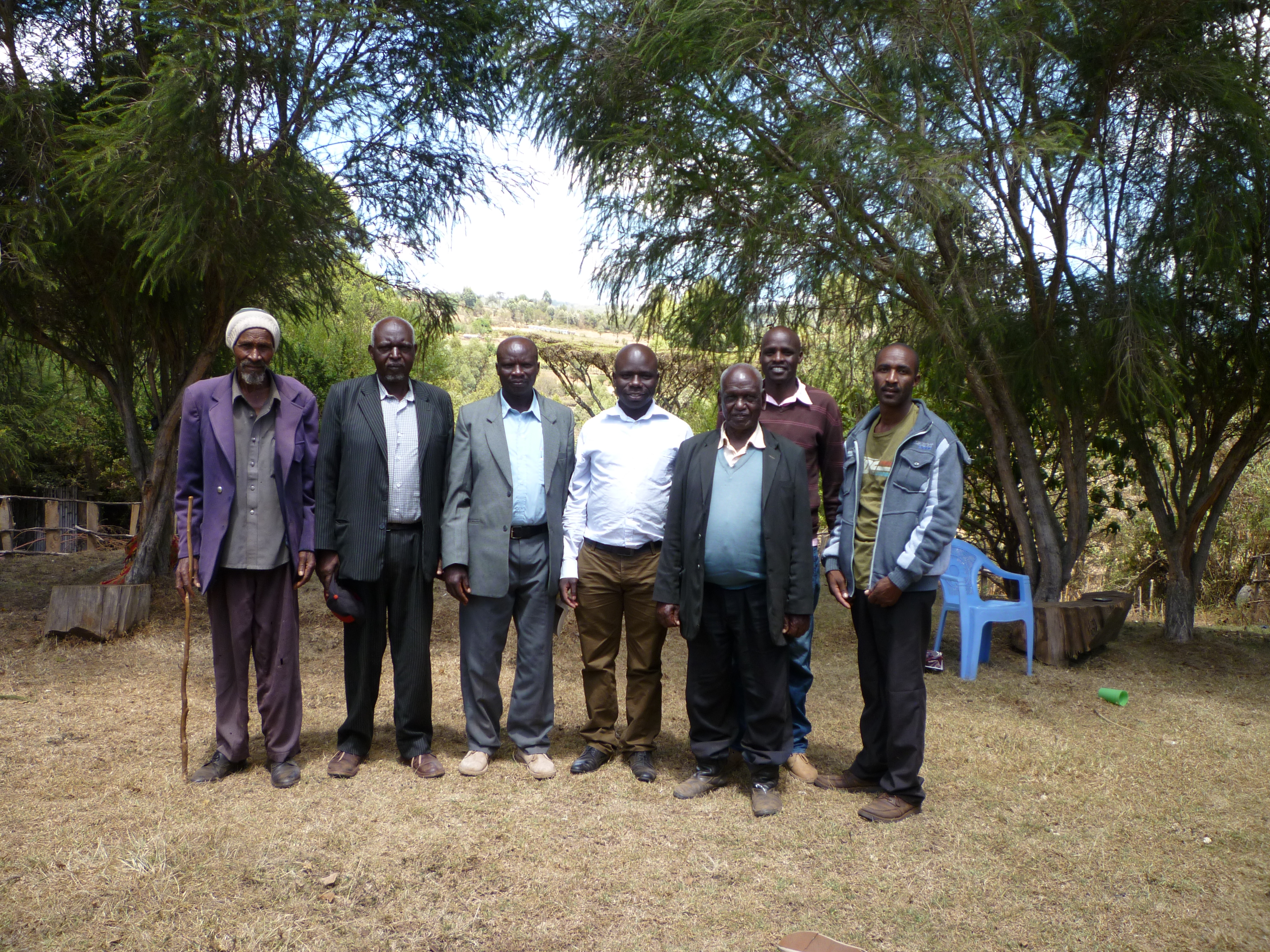 Kipsigis community Chief and Elders standing with Research Assistant David Ngira Otieno (centre)