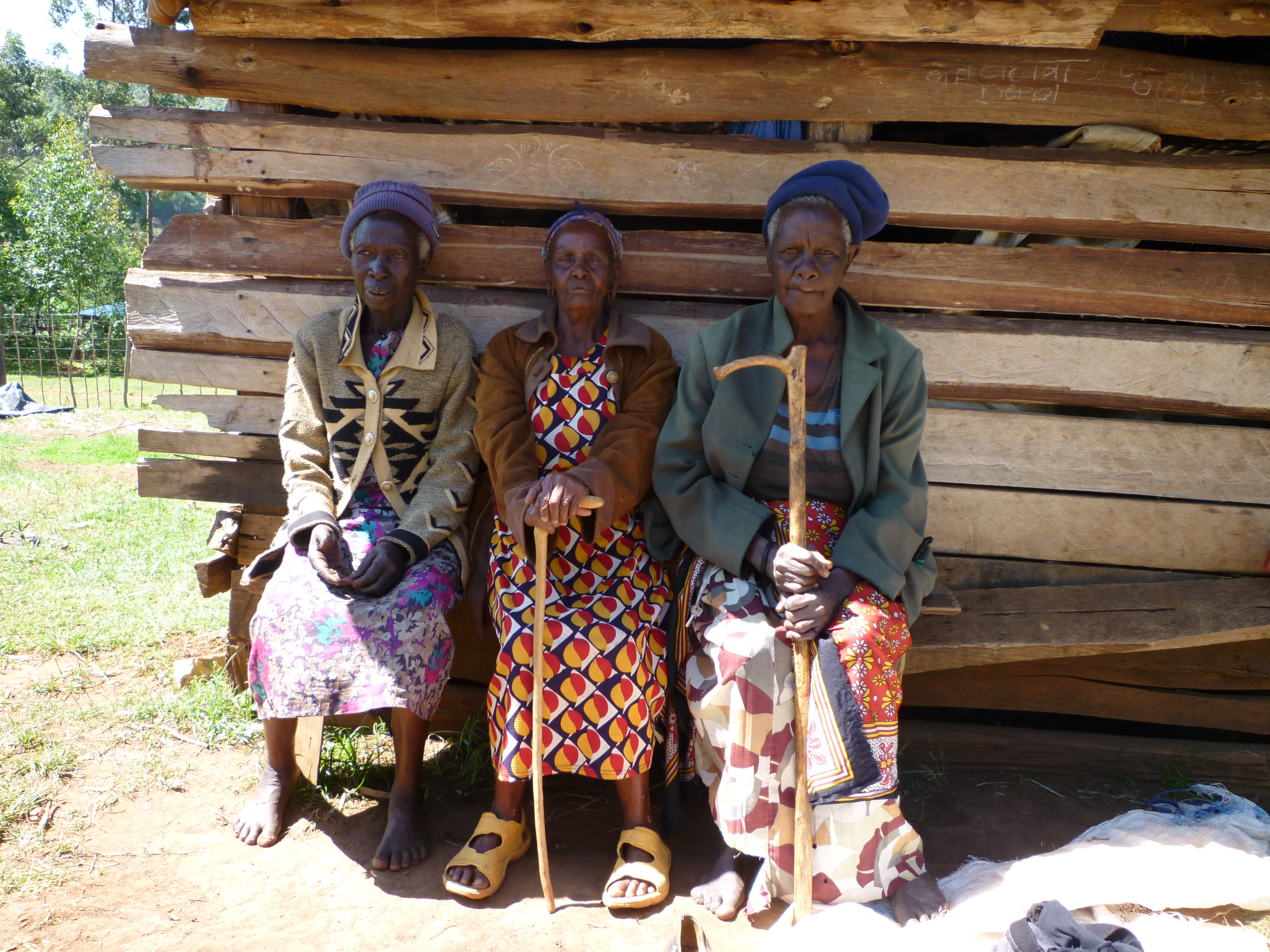 Older woman and younger woman in a woman-to-woman marraige with an interpreter of customs (Nandi Community)
