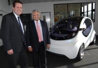 Professor Lord Bhattacharyya (right) and Nick fell (left) with the Pixel car